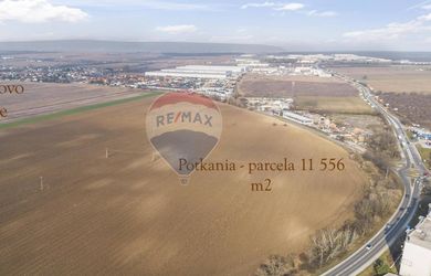 PREDAJ : Investičný pozemok 11 556 m2 - lokalita Potkania, Senec.